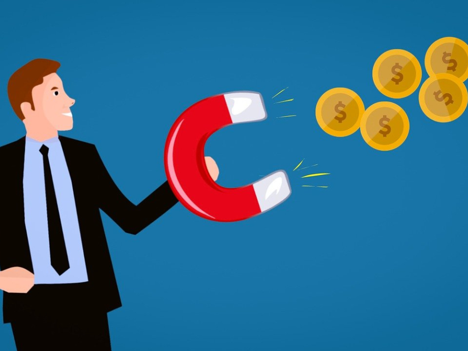Illustratie van een man met een magneet die geld aantrekt